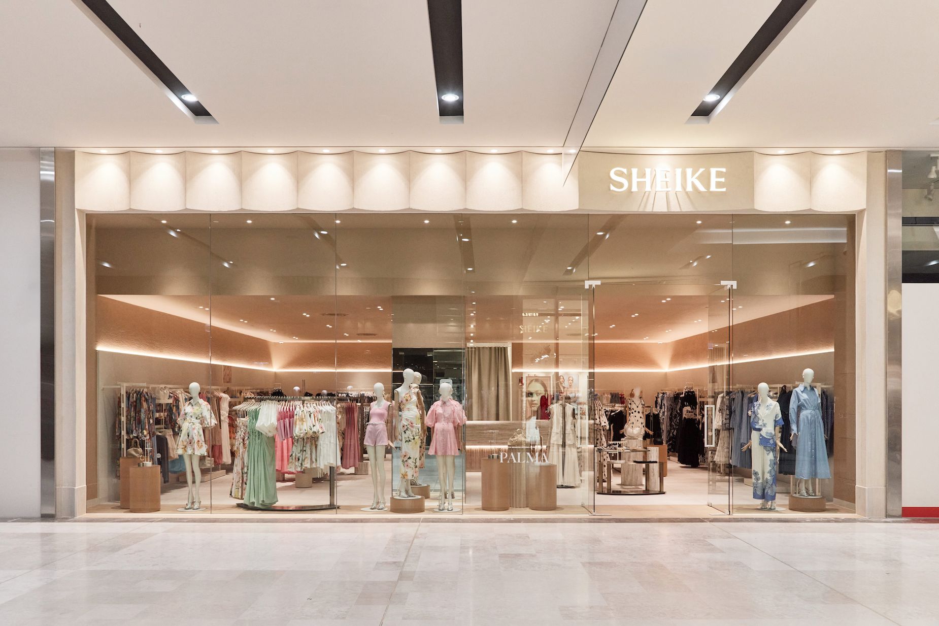Fitting-room zone set behind the retail floor